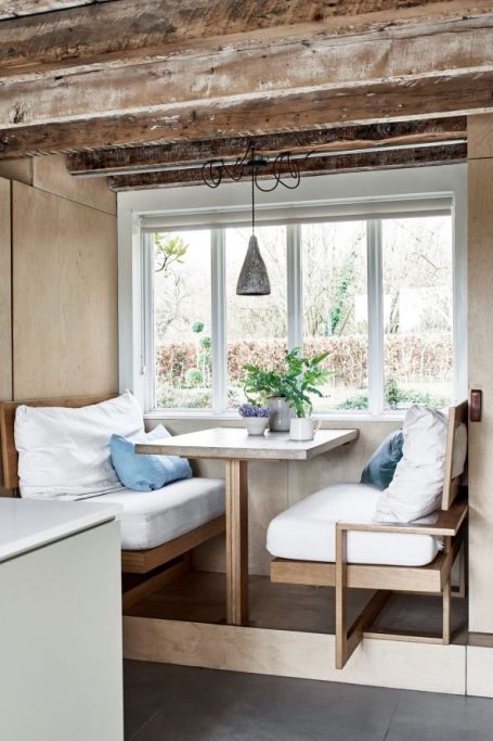 Cosy kitchen seating precedent used by MUSTARD Plans